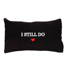 Load image into Gallery viewer, Black canvas pouch with the wording I Still Do