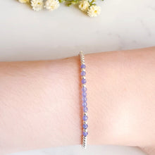 Load image into Gallery viewer, Silver bead bracelet with purple/blue gemstones in the centre of the bracelet
