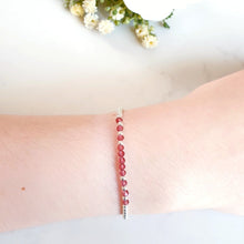 Load image into Gallery viewer, Red Garnet faceted gemstones in the centre of sterling silver beads