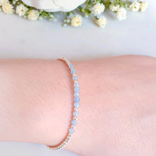 Load image into Gallery viewer, Aquamarine gemstone beaded bracelet in the centre of sterling silver beads