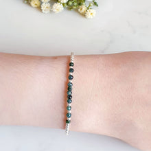 Load image into Gallery viewer, Faceted emerald beaded gemstones in the centre of sterling silver beads