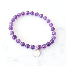 Load image into Gallery viewer, 6mm amethyst beaded bracelet with 10mm initial charm. Bracelet has small sterling silver beads inbetween.
