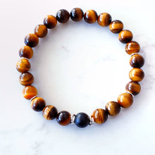 Load image into Gallery viewer, 8mm tigers eye bracelet with a matt black agate stone in the centre and sterling silver rings