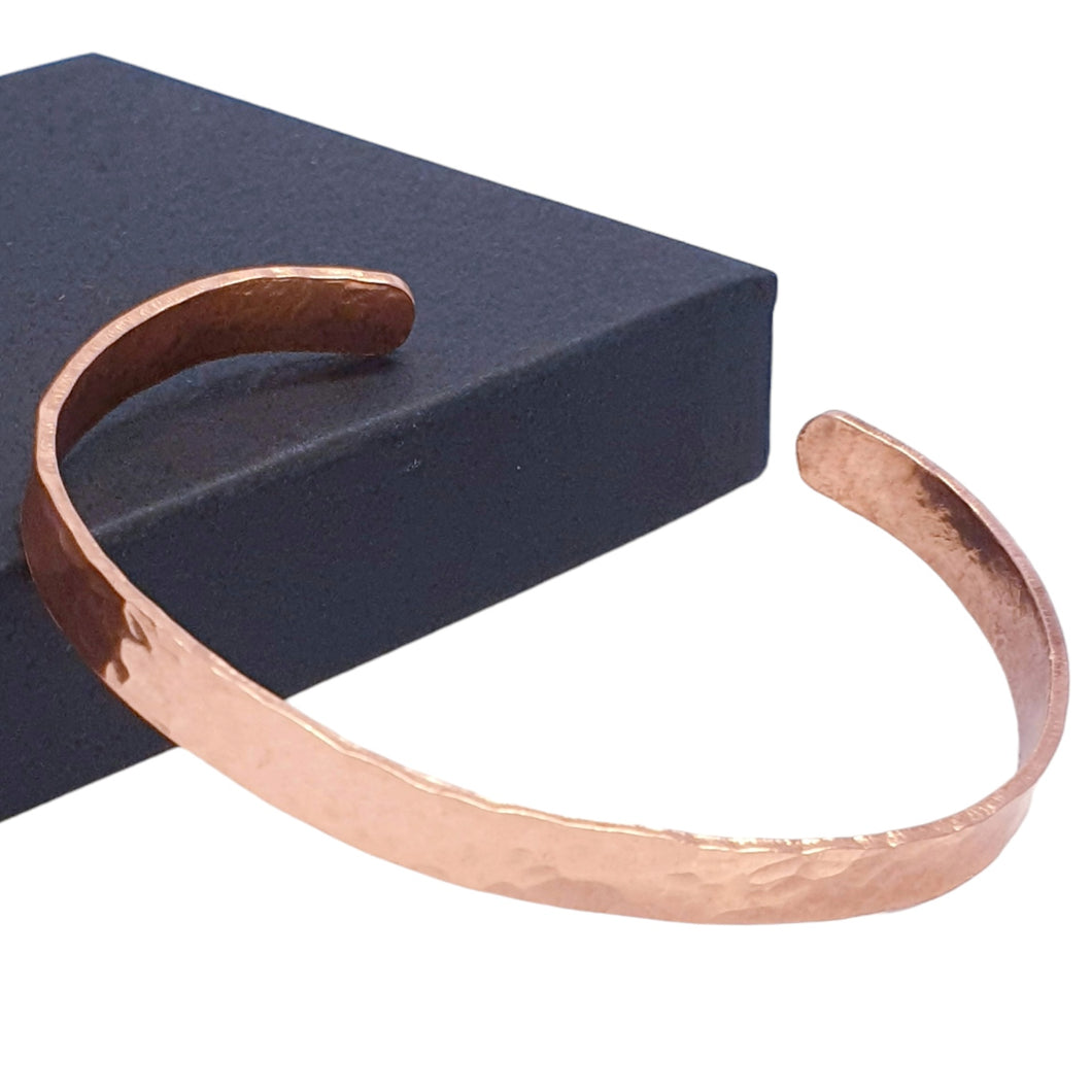 99% copper cuff with a hammered texture