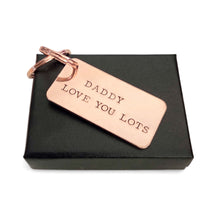 Load image into Gallery viewer, A copper keyring with 2 split rings, with the wording Daddy, love you lots
