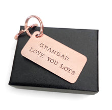 Load image into Gallery viewer, A copper keyring with 2 split rings, with the wording Grandad love you lots
