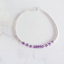 Load image into Gallery viewer, Amethyst gemstones in the centre of sterling silver beads
