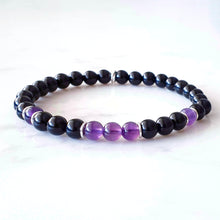 Load image into Gallery viewer, Stretch bracelet, 6mm purple Amethyst and Black Obsidian gemstones, with sterling silver rings as occasional spacers
