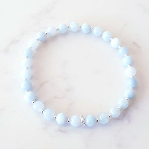 Aquamarine, blue crystal stretch bracelet with sterling silver beads and rings
