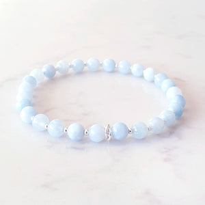 Aquamarine, light blue stone stretch bracelet with sterling silver beads and rings