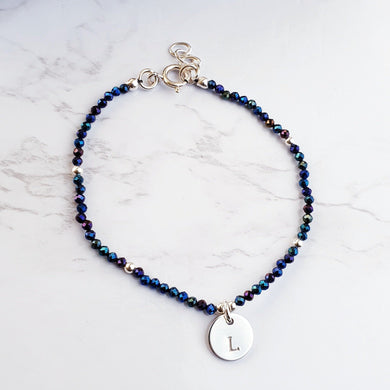 Dark Blue faceted spinel beaded gemstone with personalised initial circle charm.  Sterling silver