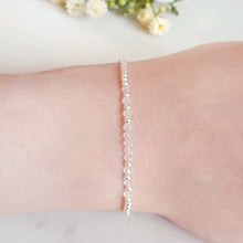 Load image into Gallery viewer, 3mm clear quartz in the centre with 2mm sterling silver beads

