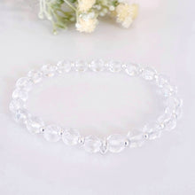 Load image into Gallery viewer, 6mm faceted clear crystal quartz stretch bracelet with sterling silver beads
