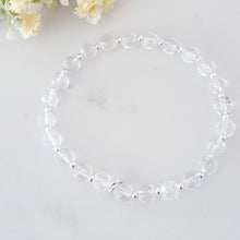 Load image into Gallery viewer, 6mm faceted clear crystal quartz stretch bracelet with sterling silver beads
