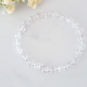 6mm faceted clear crystal quartz stretch bracelet with sterling silver beads