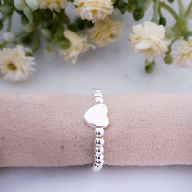 Dainty heart ring beaded ring in sterling silver with a heart in the centre