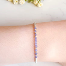 Load image into Gallery viewer, Silver bead bracelet with purple/blue gemstones in the centre of the bracelet
