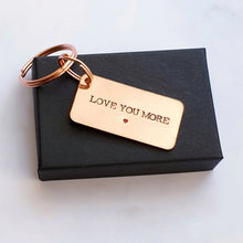 Load image into Gallery viewer, Love you more copper keyring with red heart.  7th and 22nd wedding anniversary
