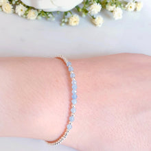 Load image into Gallery viewer, Aquamarine gemstone beaded bracelet in the centre of sterling silver beads
