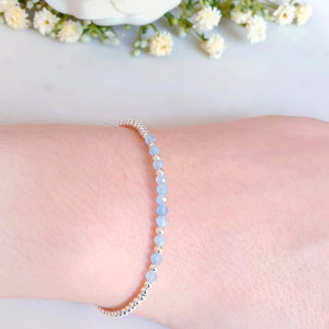 Aquamarine gemstone beaded bracelet in the centre of sterling silver beads