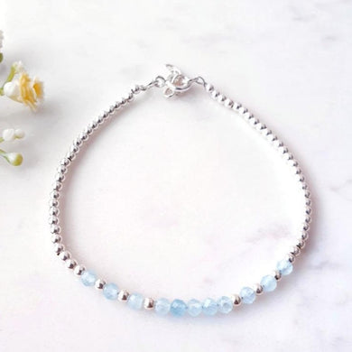 Light blue gemstone beaded bracelet in the centre of sterling silver beads