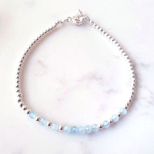 Load image into Gallery viewer, Blue gemstone beaded bracelet in the centre of sterling silver beads
