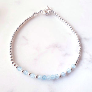 Blue gemstone beaded bracelet in the centre of sterling silver beads