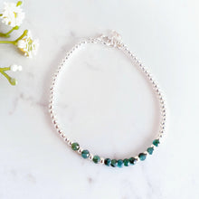 Load image into Gallery viewer, Green gemstones in the centre of silver beads
