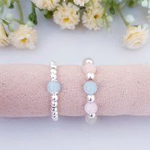 Load image into Gallery viewer, Beaded stretch rings in pastel colours and sterling silver
