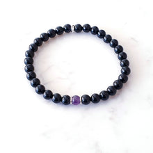 Load image into Gallery viewer, Stretch bracelet, Black Obsidian with Amethyst centre bead with sterling silver rings
