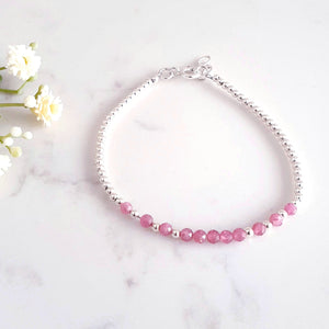 3mm pink tourmaline gemstone beads in the centre of sterling silver beads