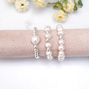 White pearl beaded rings with sterling silver