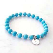 Load image into Gallery viewer, Blue Howlite stone bracelet with sterling silver beads inbetween and a personalised disc charm
