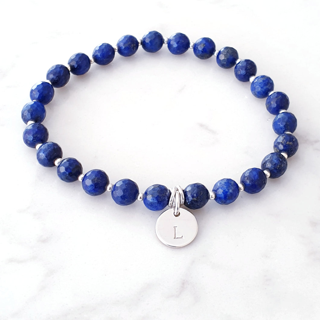 Lapis Lazuli beaded bracelet with sterling silver beads inbetween and a personalised disc charm