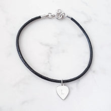 Load image into Gallery viewer, Black leather bracelet, 3mm thick with a sterling silver heart charm with an initial.  Bracelet has an extender
