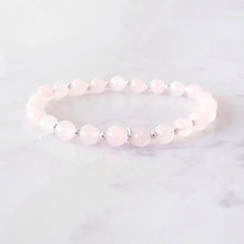 Load image into Gallery viewer, 6mm rose quartz bracelet, with 3 linked rings in the centre and silver beads inbetween each gemstone
