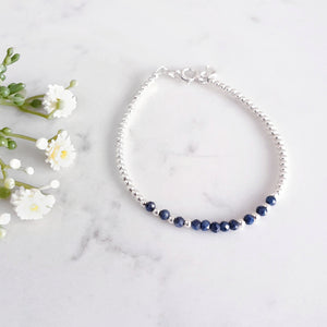 Rich blue sapphire gemstone beads with round sterling silver beads