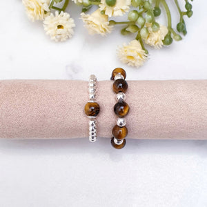 Brown stones with caramel tones, and sterling silver beads