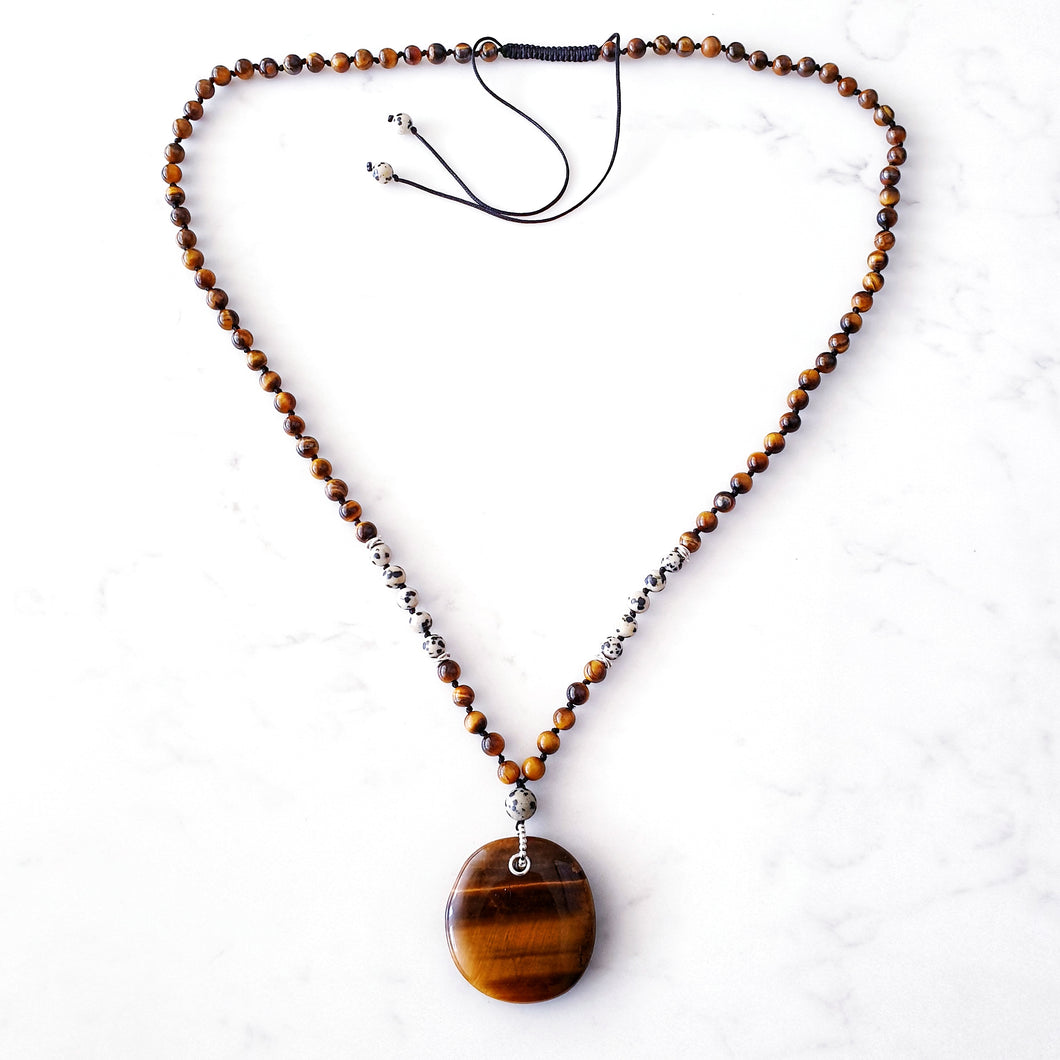 Tigers Eye and Dalmatian Jasper necklace, with sterling silver rings and beads.  Sliding knot adjustable closure