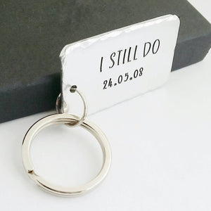 Personalised I STILL DO keyring.  Add anniversary date.  45mm x 25mm, textured around the edges.  Small and large split rings.  Silver aluminium.   