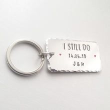 Load image into Gallery viewer, Personalised I STILL DO keyring with red hearts.  Add anniversary date and initials. 45mm x 25mm, textured around the edges.  Silver aluminium.  
