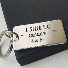Load image into Gallery viewer, Personalised I STILL DO keyring with red hearts.  Add anniversary date and initials. 45mm x 25mm, textured around the edges.  Silver aluminium.    
